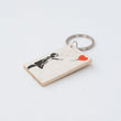 Portachiavi bimba con cuore Banksy in legno con sacchetto in batik COD: 22432385800