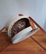 Borsa tonda in rattan e tessuto con inserti e tracolla in pelle Kenty