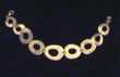 Bracciale ad anelli ovali color oro SAT019 Ida Onlus