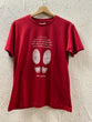 T-shirt unisex rossa Dobbiamo abituarci all'idea S