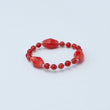 Bracciale con perline in ceramica verificata rosso e perline piccole oro COD: 21129512200